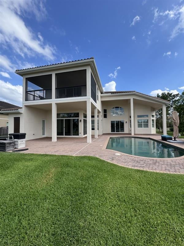 Rear elevation, patio and pool deck after painting